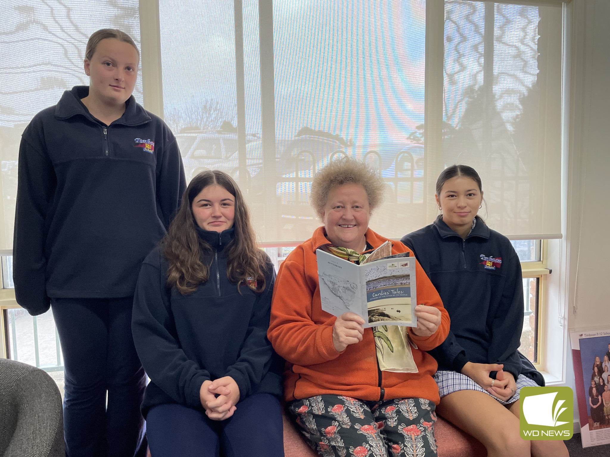 History kept: Timboon P-12 School students pictured with interview subject Helen Langley who shared her stories about the Curdies.