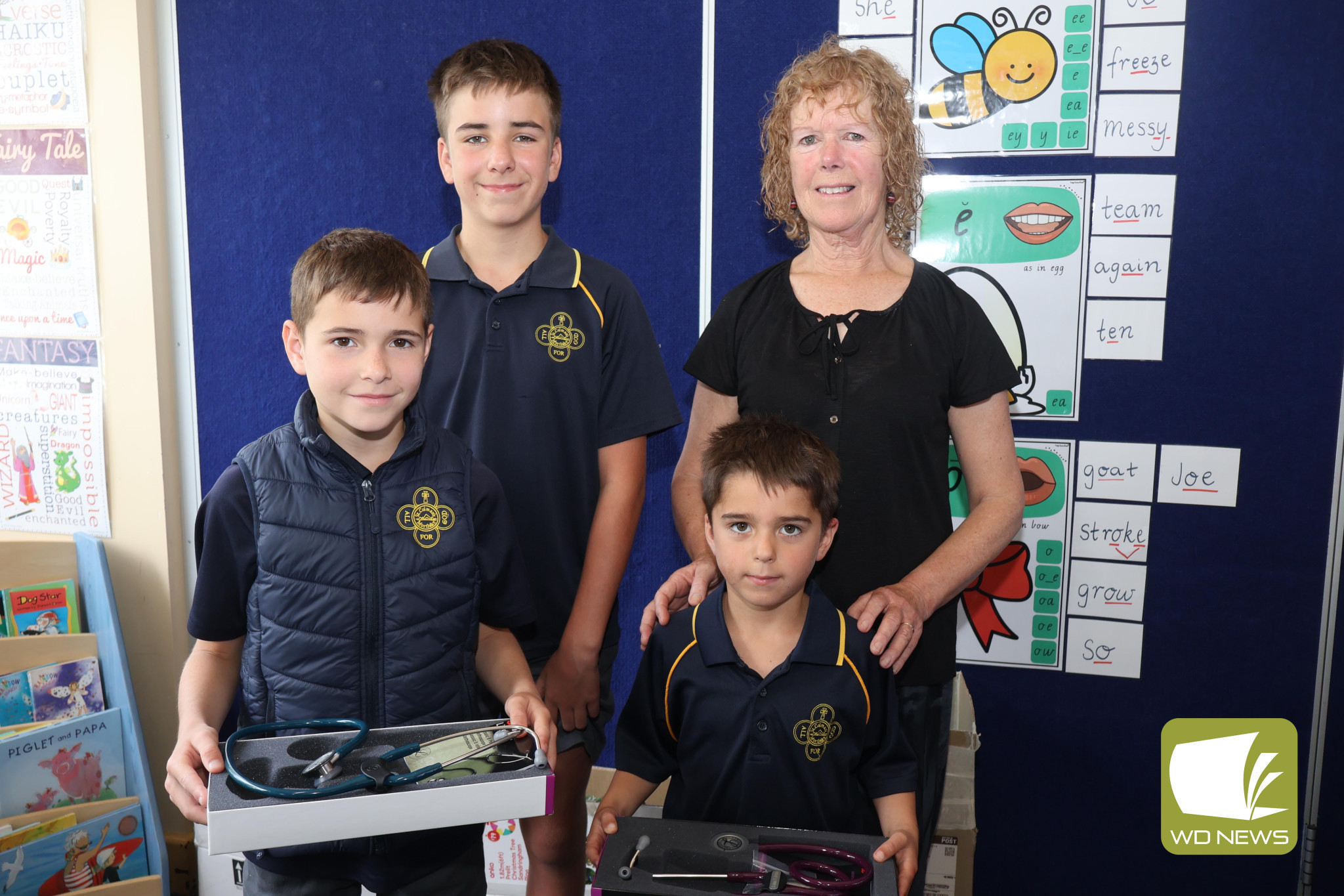 Generosity: Ann-Maree Convery’s efforts to help Timor-Leste citizens who are living in poverty has inspired a student-led fundraiser at St Colman’s Primary School. Mrs Convery is pictured with her grandchildren Mason (back), Archie (front left) and Knox Dale this week after she visited the school to show students the medical equipment purchased thanks to the fundraiser which students organised in September.