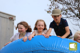 All smiles: There was plenty of entertainment off the track for the kids.