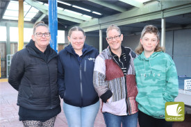 Shannon Taylor (from left), Jorja Simper, Georgie Simper and Braxton Simper were among those braving the cold morning weather to enjoy a warm breakfast.