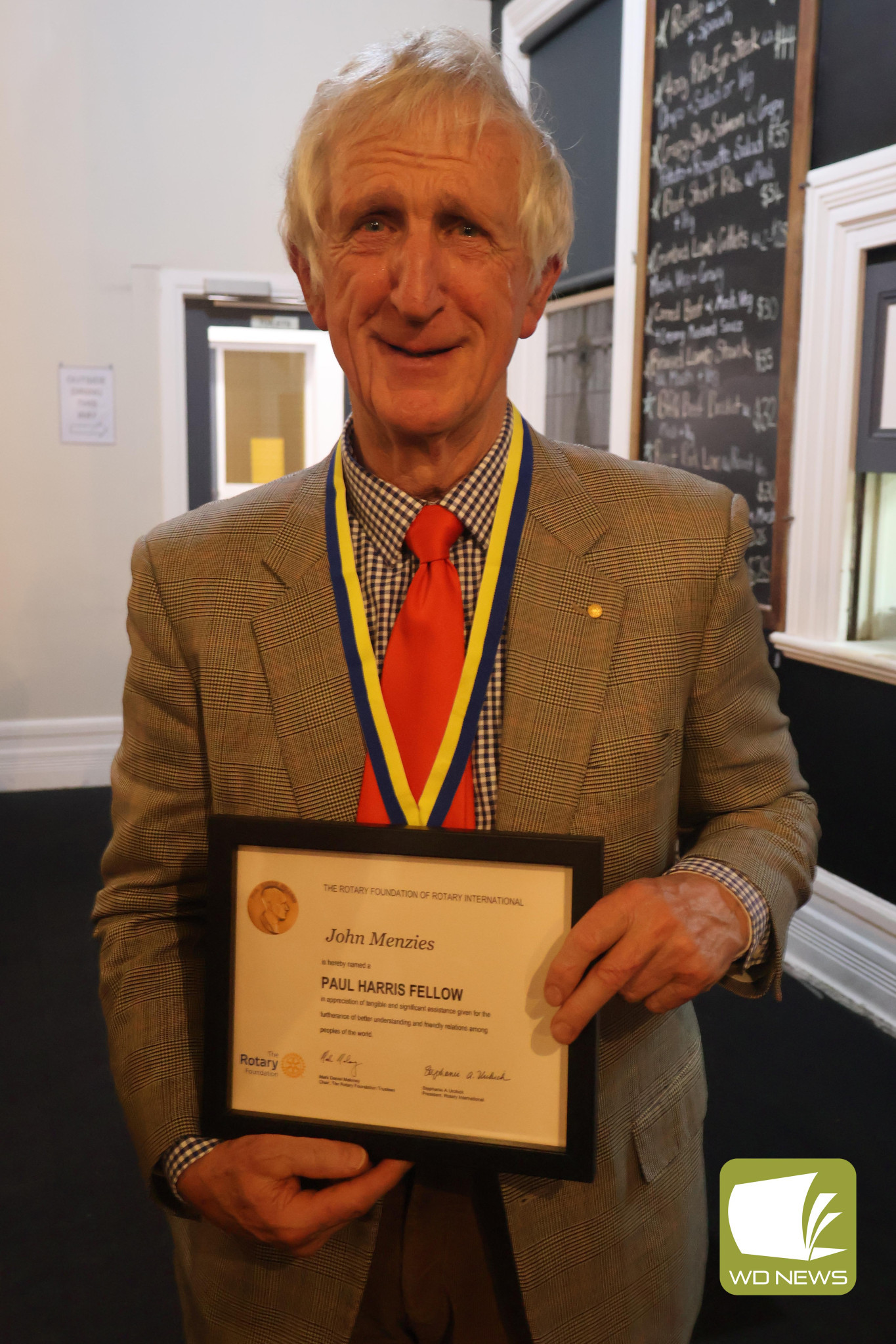 High honour: Dr John Menzies OAM was presented with a Paul Harris Fellowship during Rotary’s annual dinner on Monday.