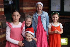 Festive fashion: Tessa, Remi, Amber and Frankie Narik (pictured with Carole Manifold) were dressed up in the finest Christmas attire for the Christmas in Camperdown weekend.