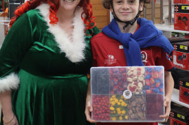 Lucky winner: Michelle Elijah with prize winner Cooper, who chose the Sweet Gifts lolly hamper.