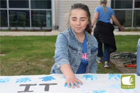 Dolly’s Dream: Dressed in all blue, Mackenzie Gurry was happy getting blue hands too.