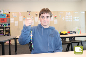 Beaded bracelets: Harper Webber strung some beads together during one of the activities.