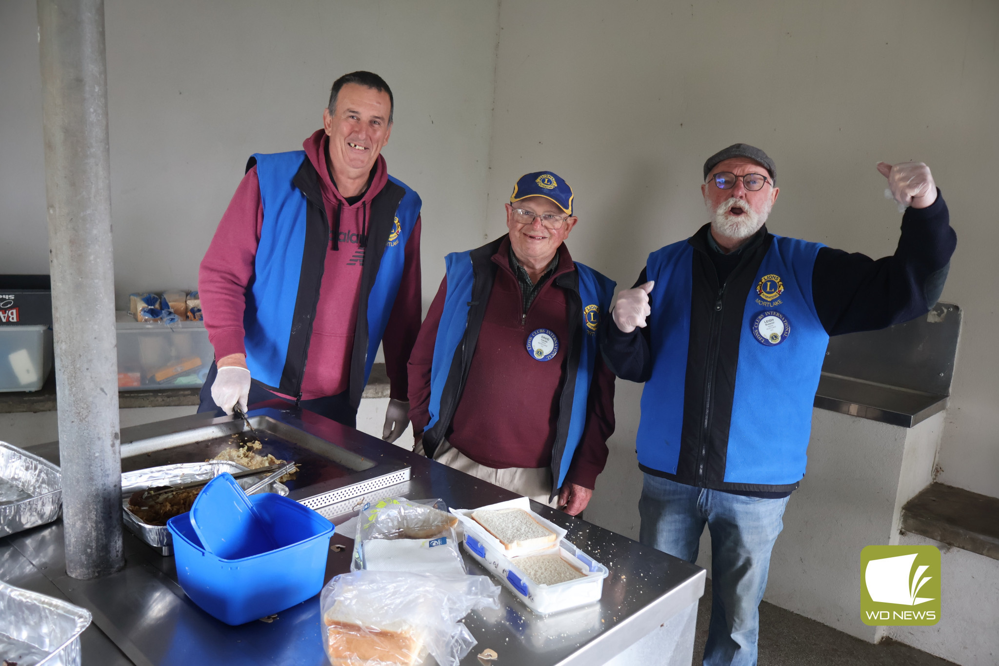 Mortlake Lions Club members manning the barbecue have kept hungry marketgoers fed.