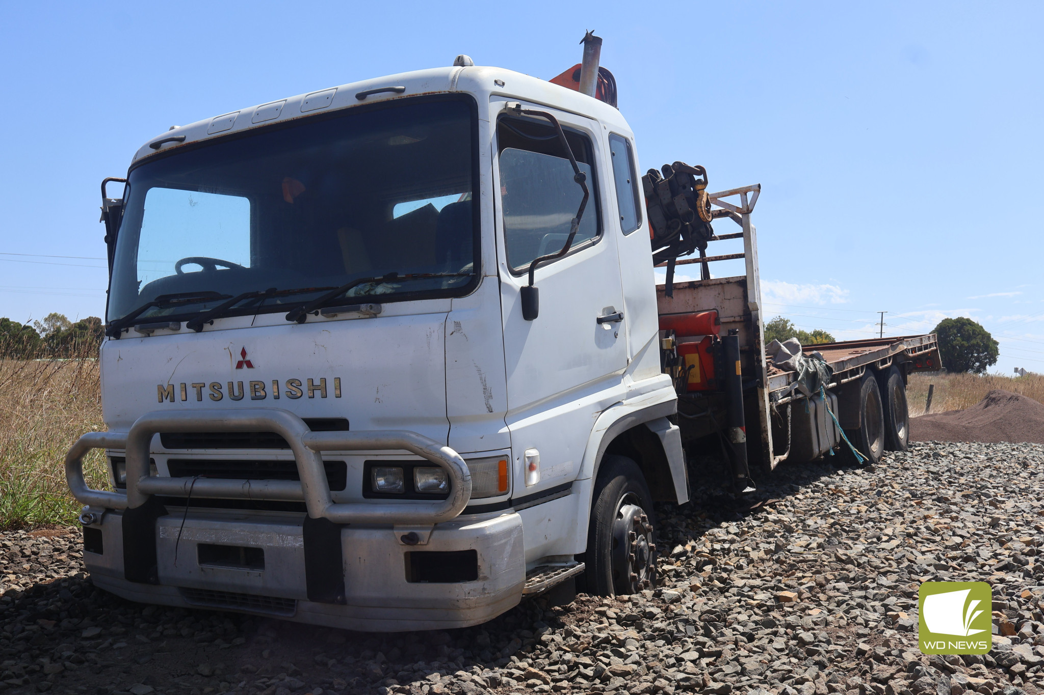 Abandoned: A stolen truck, which has been left stuck in rocks near the rail line on Sampsons Ford Road in Garvoc, has remained abandoned despite complaints having been raised.