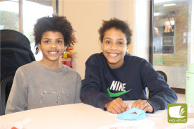 Jemimah and Matilda Abe used textas to colour in their own bags.