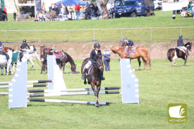 Showing off skills: The showjumping and dressage events at the centre of the showgrounds provided additional entertainment for families throughout the day.