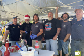 The Guzzlers Car Club manned a barbecue to help keep people fed.