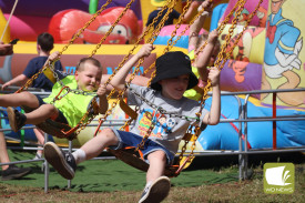 Spinning around: Younger Noorat Show attendees jumped at the chance to swing around on rides.