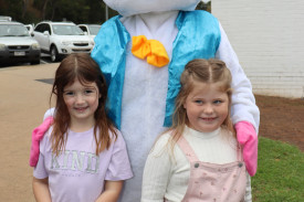 Milla Cunnington (5, from left) and Evaliah Weel (5) met the Easter bunny with big smiles.