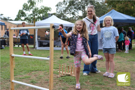 Matilda (6) and Audrey (9) Fraser enjoyed playing the games at the Easter market.