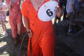 A buck’s party saw one racegoer dressed in a ladies’ outfit while wearing a ball and chain.
