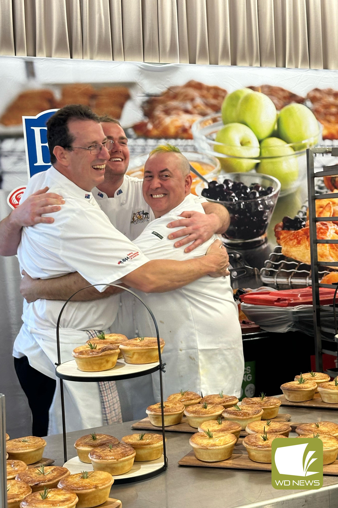 Oi Oi Oi: Brad Burkitt, pictured middle with the Australian team, was thrilled to represent his country in a trans-Tasman bake-off.