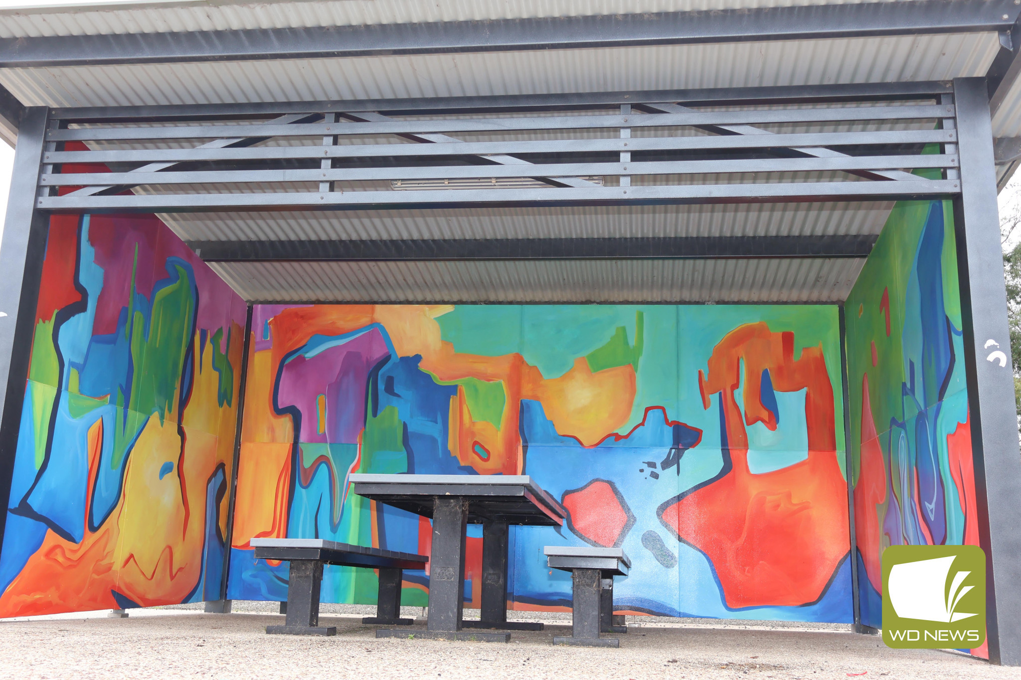 Appeal for respect: Artist James Cody-Davis hopes the mural painted at the Mortlake stake park can be left alone after having to repaint around forty per cent of it after it was vandalised earlier this year.