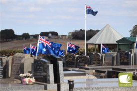 Flags were placed by the students at the gravesites of fallen servicemen and women.