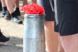 Attendees were invited to place poppies at the conclusion of the service.