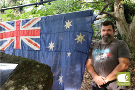 John Adams brought an iconic flag for the ceremony, highlighting its historical significance back from the Puckapunyal army barracks.