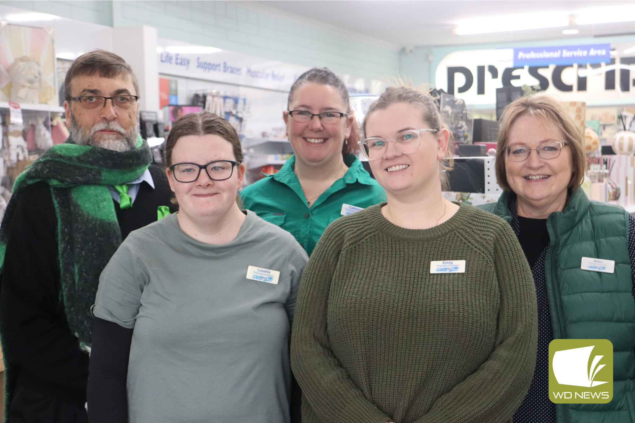Pharmacy goes green: Peter Unger (from left), Louella Frusher, Catherine Ryan, Emily Saunders and Helen Scott from Cobden Pharmacy all wore green to support the district’s farmers on Friday.