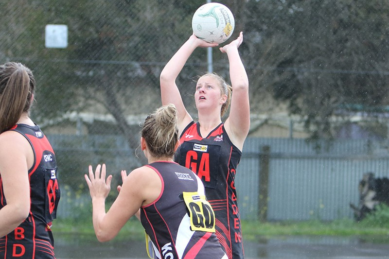 Bombers secure top spot - feature photo