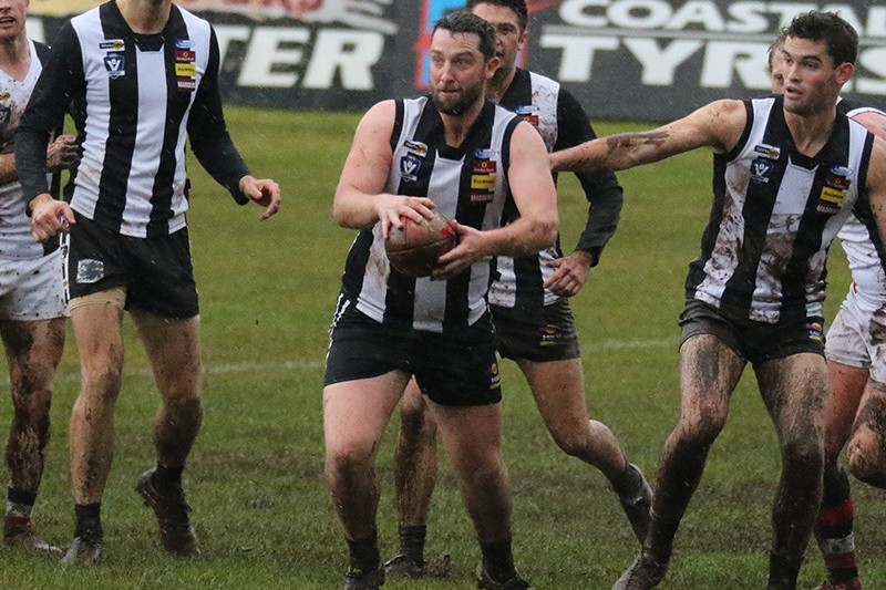 Magpies go down in the wet - feature photo