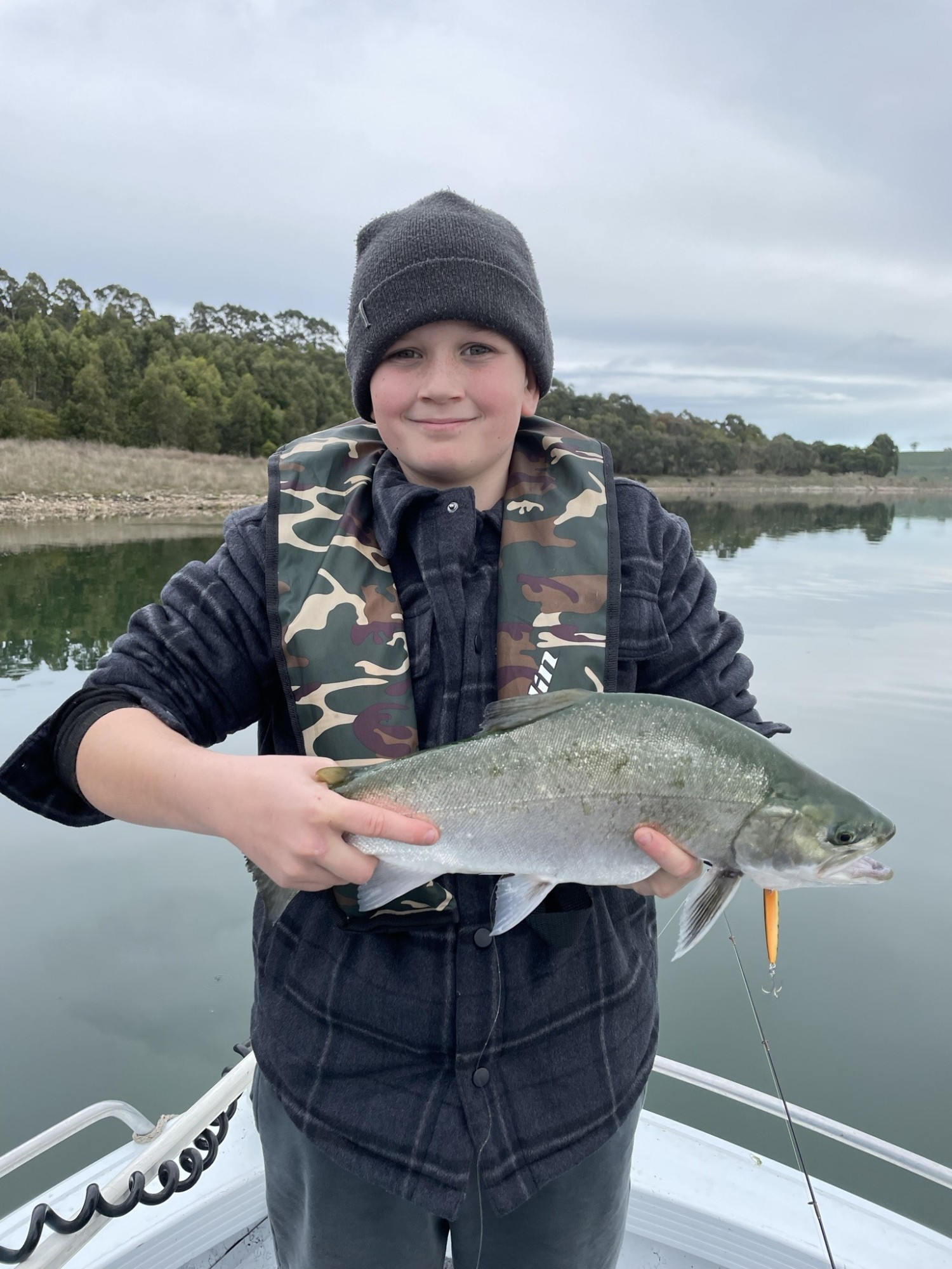 Young Max Stevens with a chunky Tiger trout from Bullen Merri which took a gold coloured minnow lure.
