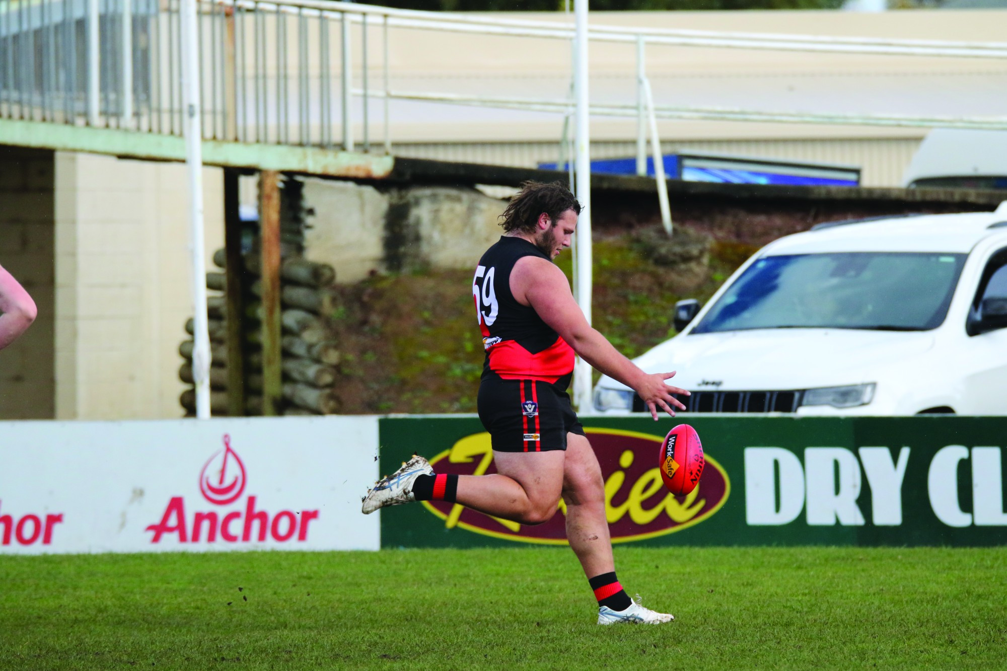 Michael Koroneos kicks one of his seven goals for the day.