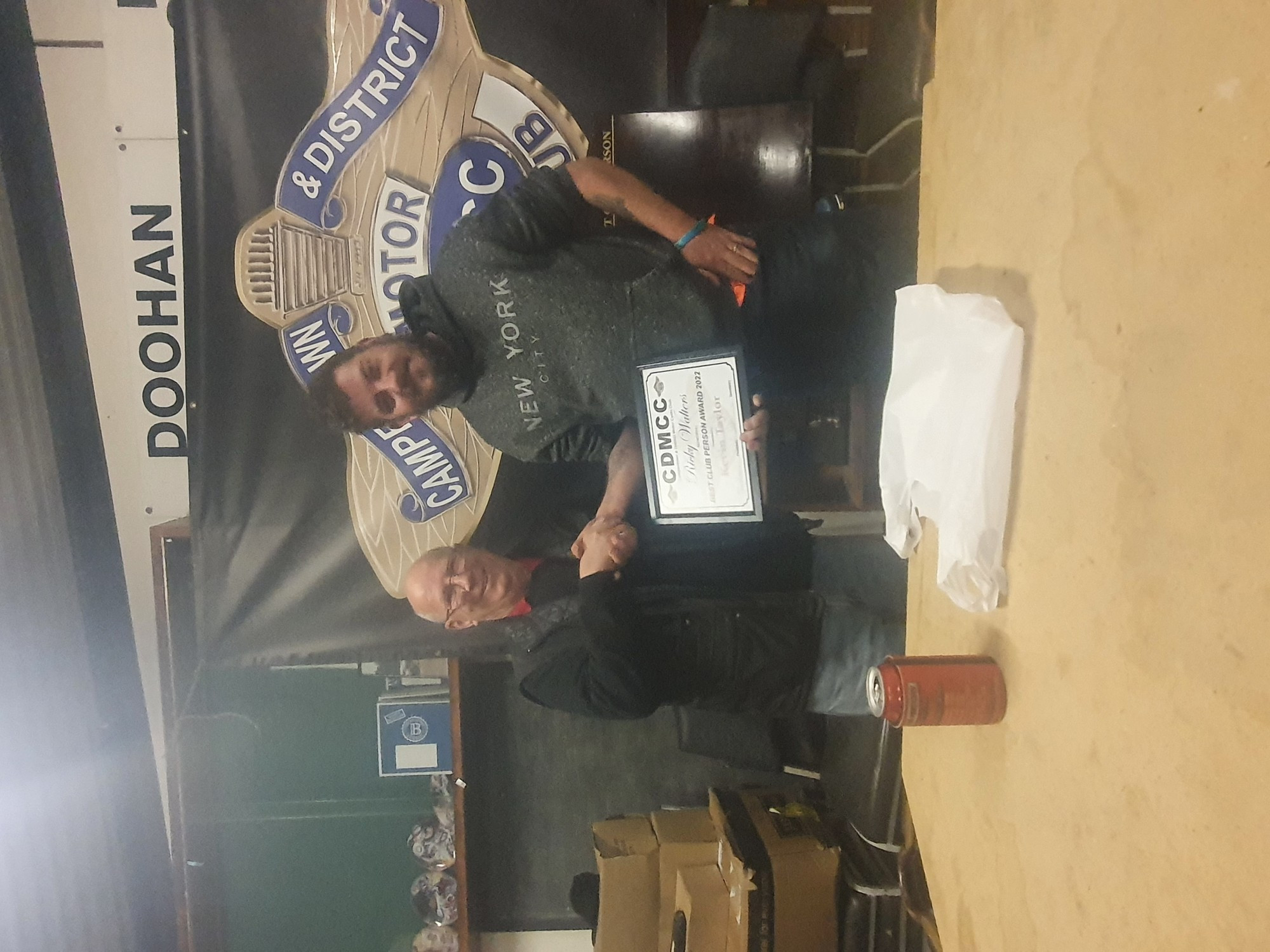 In memorial: Stephen Walters (right) presents the inaugural Rick Walters Memorial Club Person of the Year Award to Kevin Taylor.
