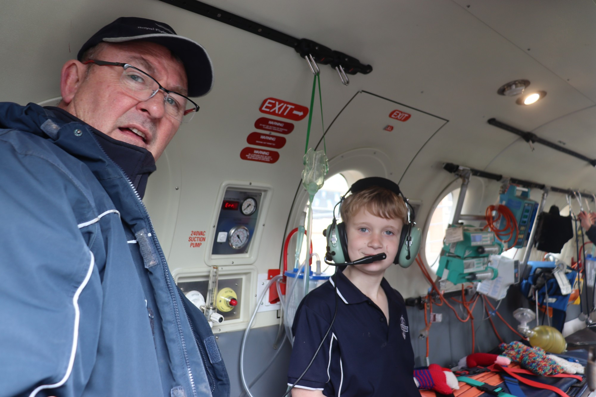 Flight simulator: Camperdown College student Emmett Gladman, pictured with Flying Doctor education program manager Tom Ryan, learns all about the Royal Flying Doctor Service.