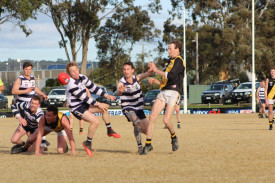 Simpson fights for the ball. 