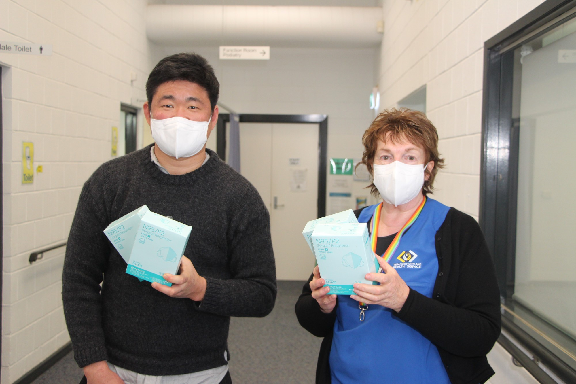 Free masks: Terang and Mortlake Health Service will be giving away free N95 masks to help stop the spread of COVID-19 under a new partnership with the Victorian Government. Pictured is TMHS health promotion officer Steven Park and social support co-ordinator Wendy Errey.