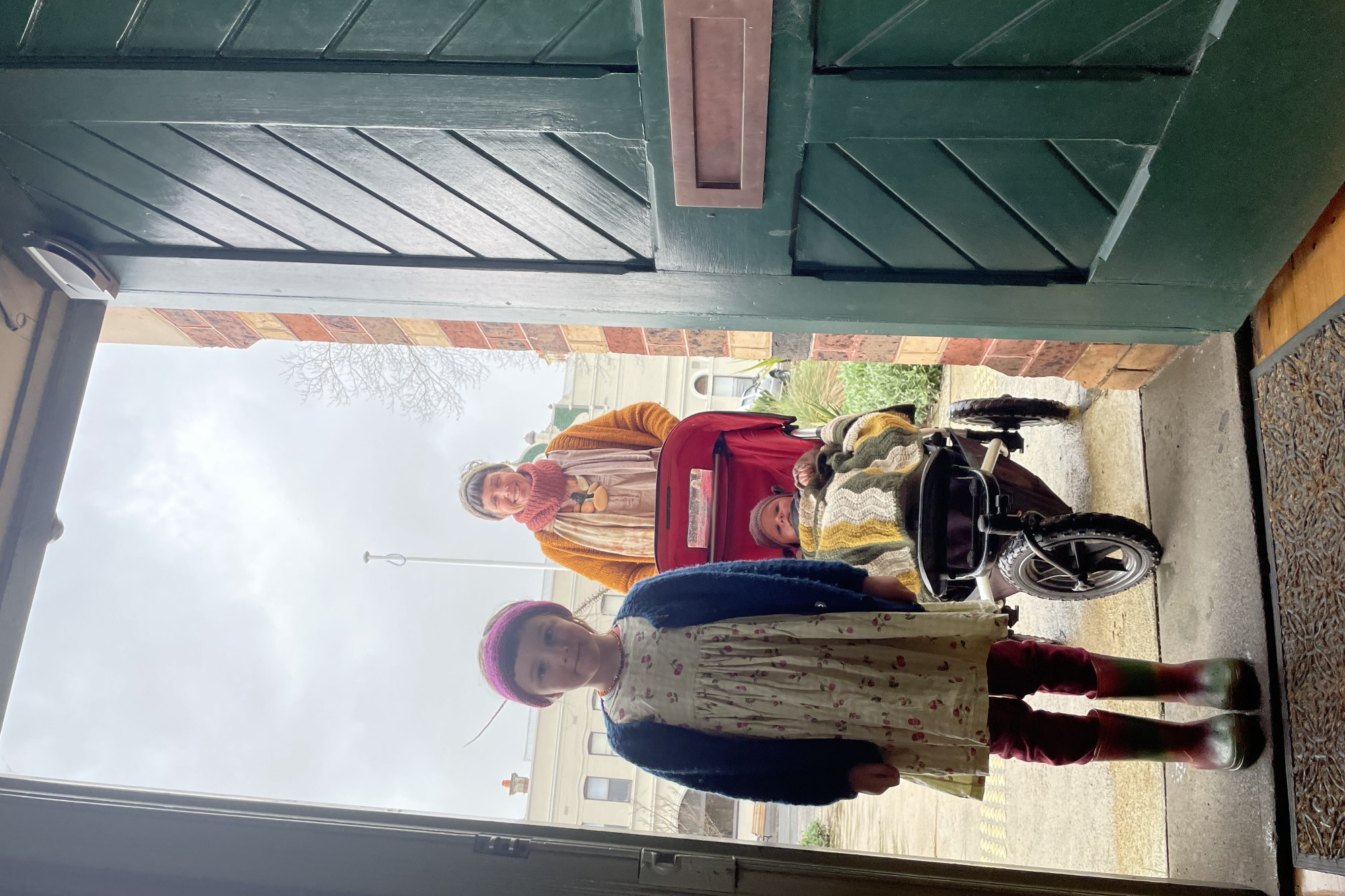 All abilities access: Becky McCann with children Xanthe (front) and Ari make use of the new all access door at the Camperdown Courthouse.