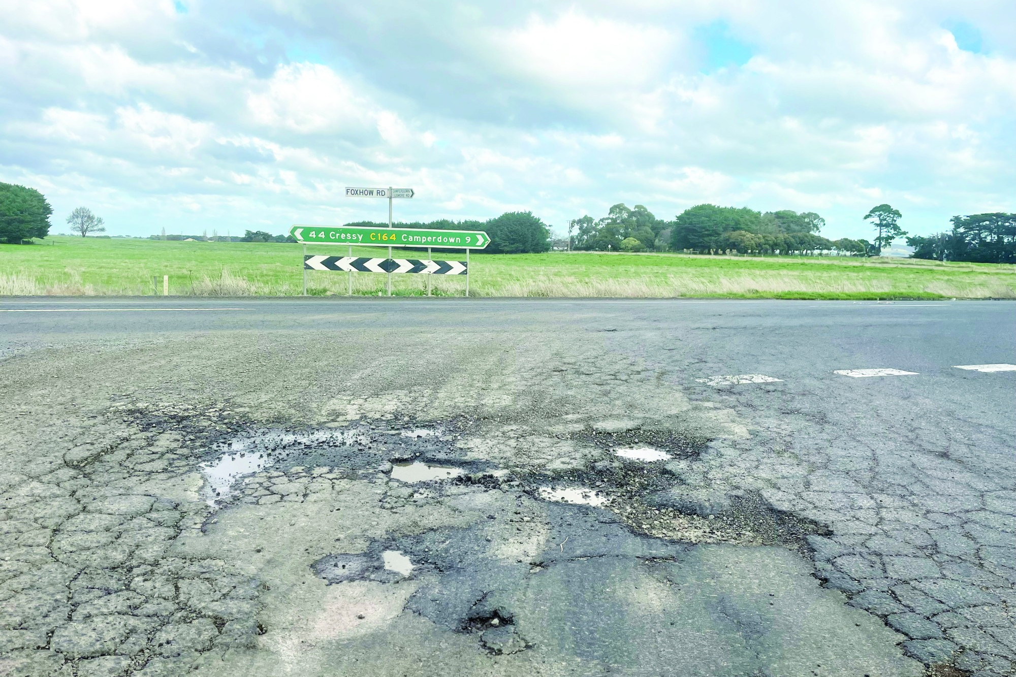 Frustrating: Motorists approaching this intersection with Foxhow Road face deteriorating road conditions.