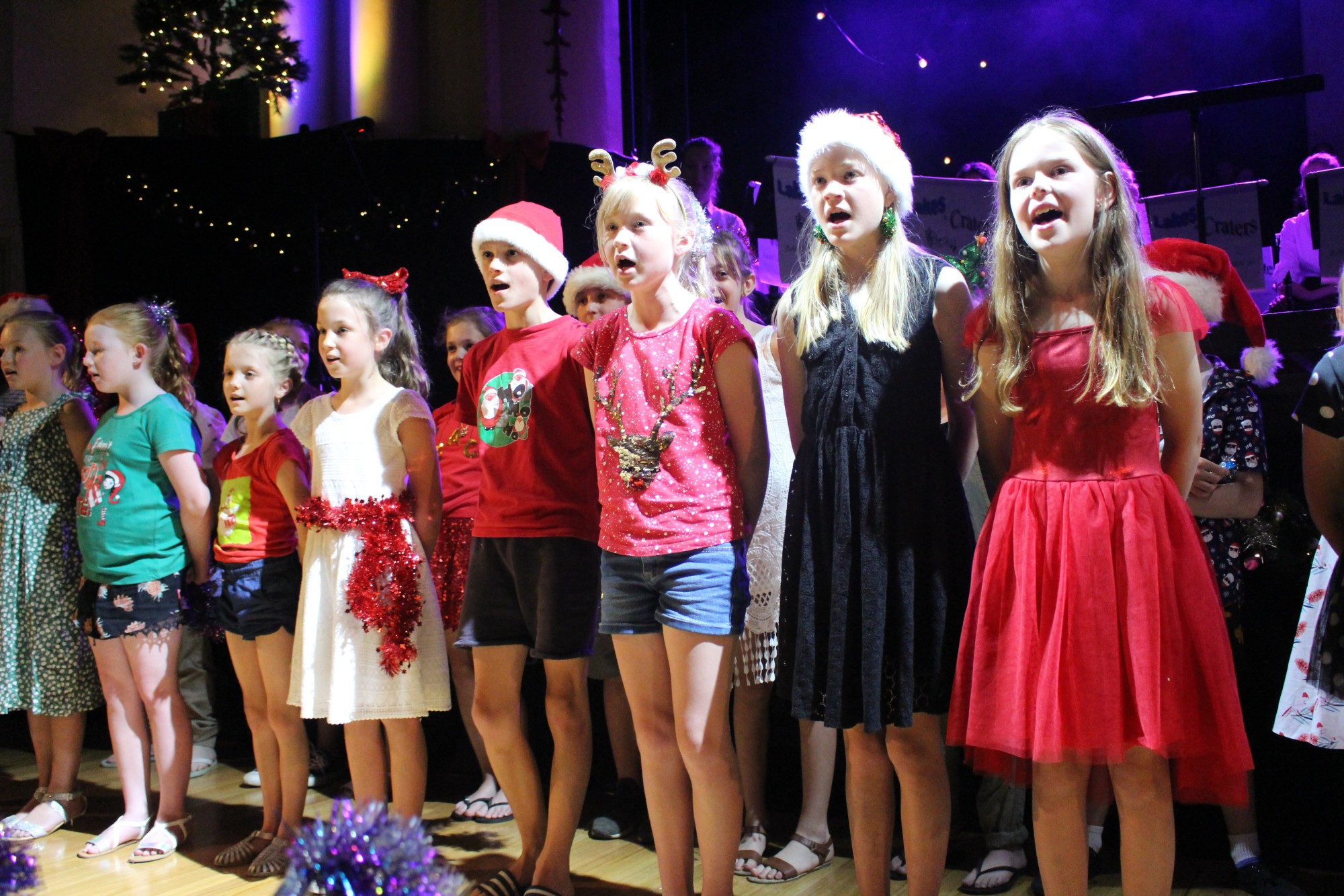 Local children help share the Christmas spirit at Camperdown’s annual Carols by Candlelight.