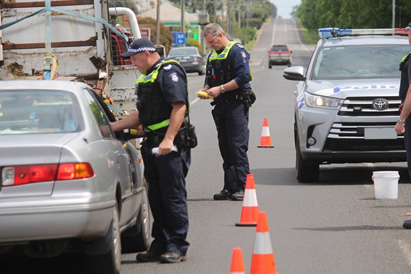 Camperdown and district police officers conduct preliminary breath tests on Manifold Street, one of several road safety initiatives carried out over the Melbourne Cup long weekend.