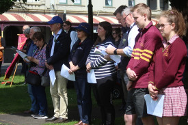 Members of the community come together to remember those fallen.