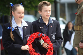 Camperdown College junior school captains pay their respects.