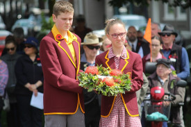 St Patrick’s Primary School captains carry a wreath.