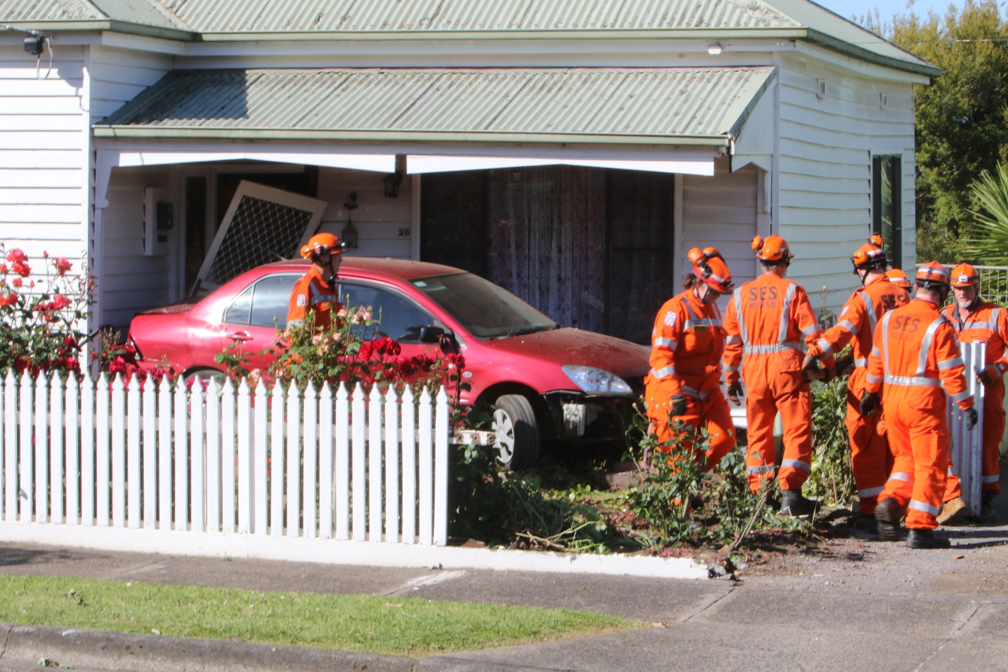 A Mitsubishi Lancer ended up parked across the road from the owner’s house on a neighbour’s verandah after a mishap on Sunday.