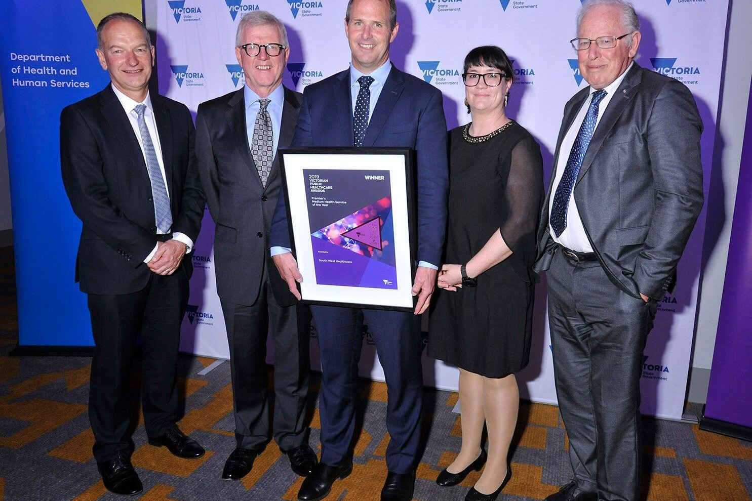 South West Healthcare representatives celebrate winning the ‘Victorian Health Service of the Year’ award. Pictured with the award are chief operating officer Andrew Trigg, board of directors chair Bill Brown, chief executive officer Craig Fraser, culture executive director Leani Viljoen and former board chair Russell Worland.