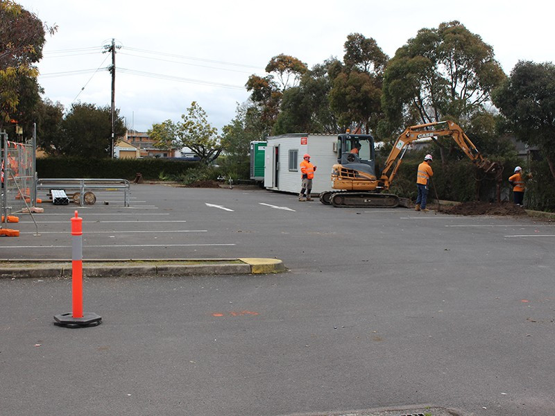 New LED lights, which are similar looking to Woolworths car park’s existing lights, are being installed as part of stage one of an upgrade.