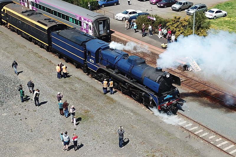 An aerial view of the R711 engine’s arrival at Camperdown station along with a S-Class steam engine and nine heritage carriages.