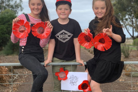 Camperdown College students Stella, Oliver and Lila Horspole marked Anzac Day at the end of their driveway this year. 