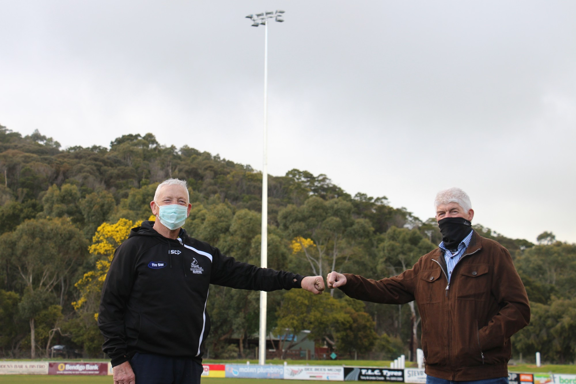 Happy days: CFNC president Kevin Russell thanks Five Star Stockfeeds owner Colin Symes for a donation toward the grounds lighting project.