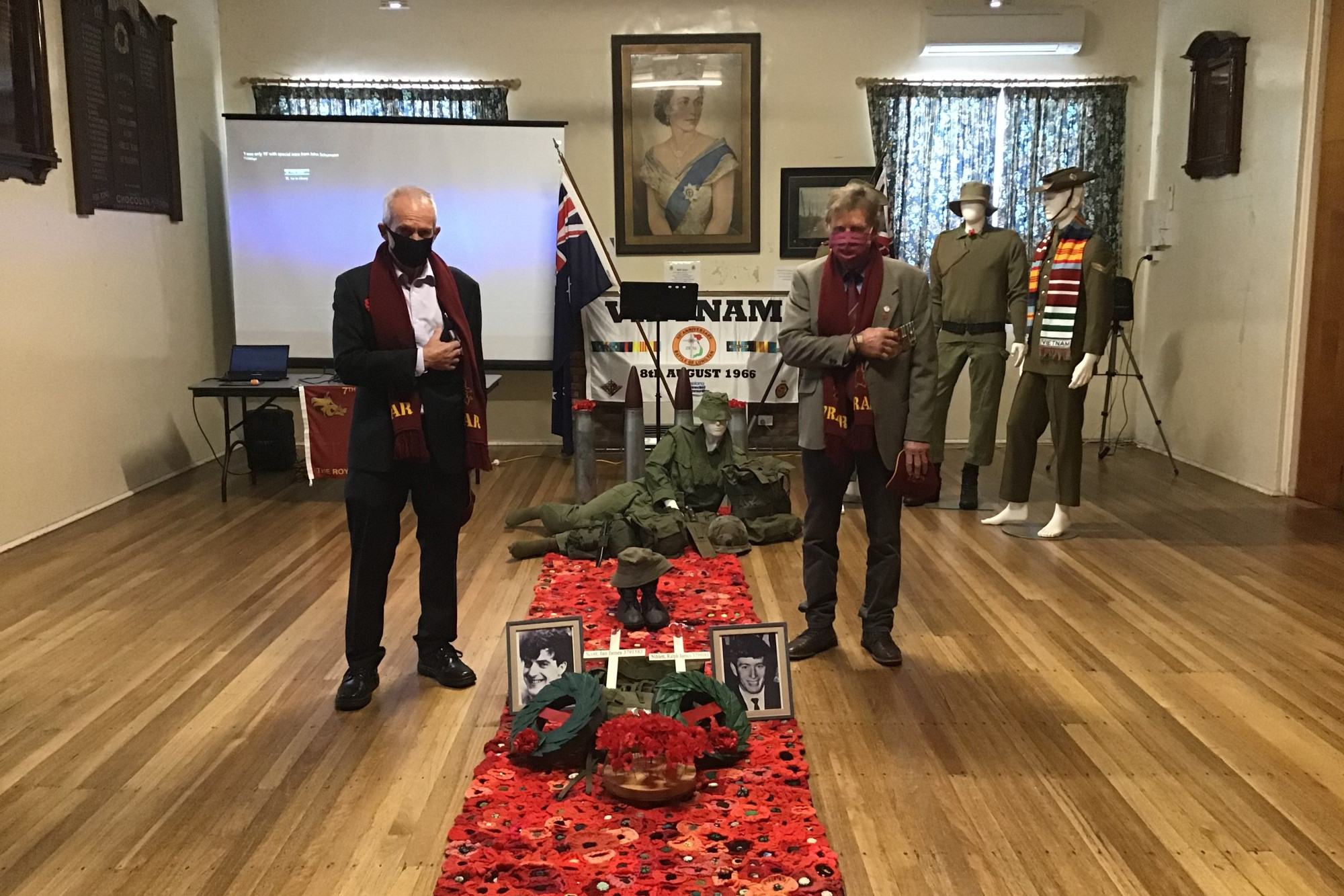 Tribute: Camperdown RSL president Alan Fleming and Andy Bell paid their respects during a service marking VV Day at the Soldiers Memorial Hall.