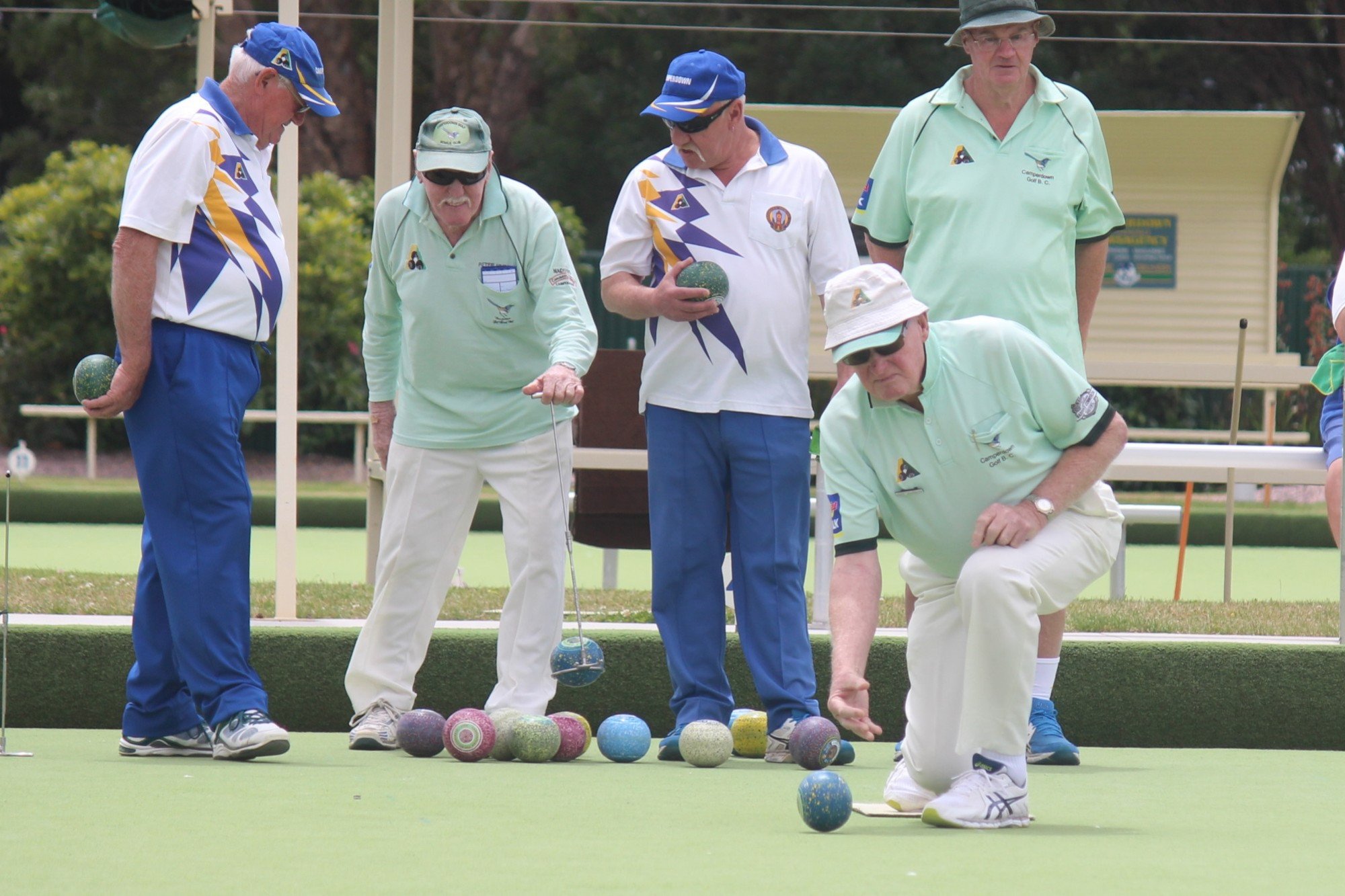 Camperdown Golf Bowls Club stalwarts Peter Hindhaugh (second from left) and Max Johnson (front) recently joined the Corangamite Bowls Show to speak about the history of the club.