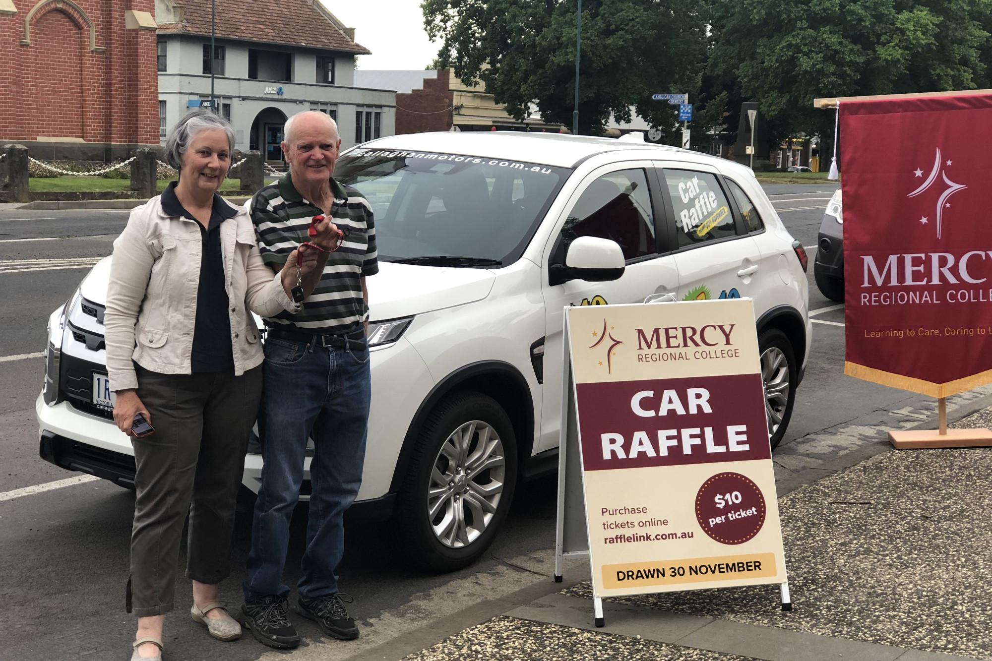 Winning feeling: After 50 years of entering, Camperdown’s Tony and Trish O’Leary were drawn as the winner of the annual MRC car raffle.