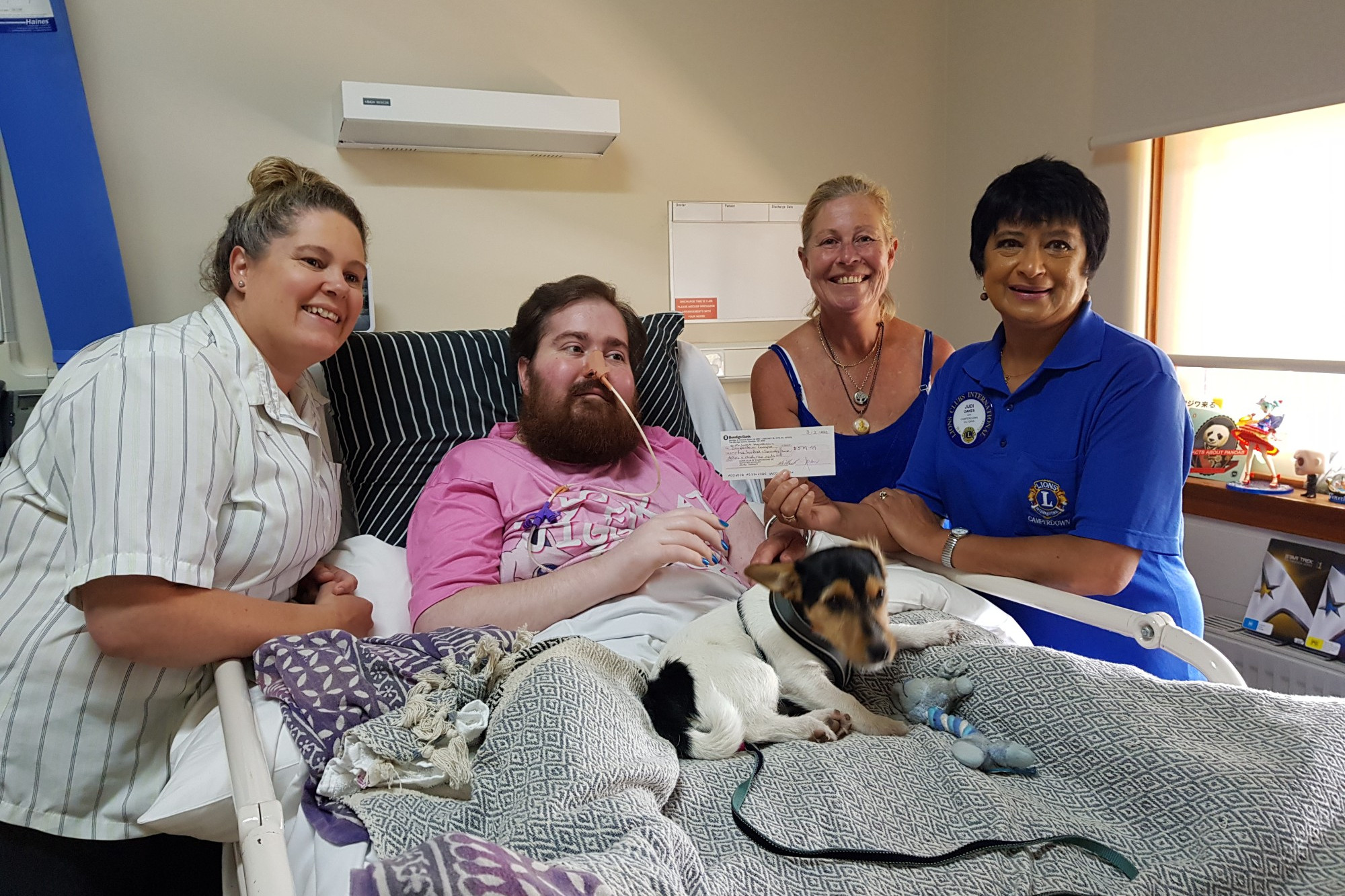 After recently falling ill with ‘Locked In Syndrome’, communicating has been difficult for Camperdown hospital patient Shaun Mather. But that is about to change thanks to a Camperdown Lions Club donation covering the cost of a new social networking app. Mr Mather is pictured with (from left) unit manager Kirsty Mitchell, his mum Karen and Lions club president Judi Oakes.