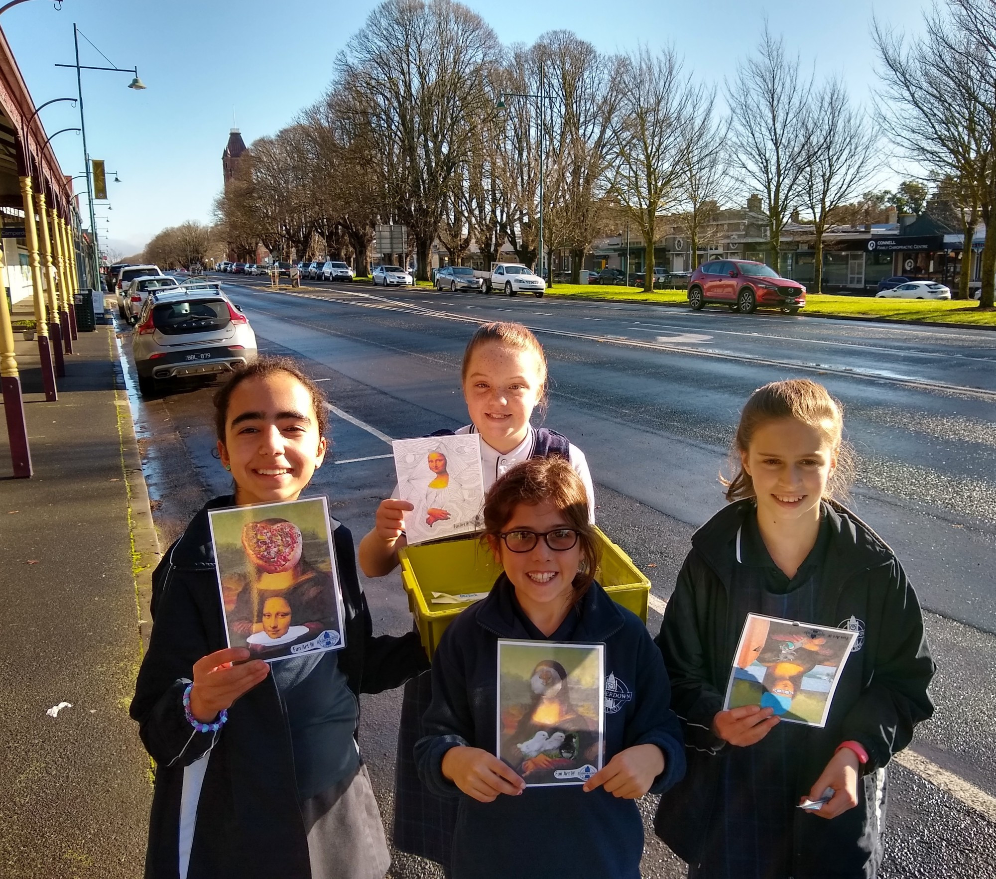 Colourful idea: Camperdown College student Patrick Spokes helps brighten up the Camperdown CBD with art.